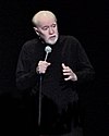 https://upload.wikimedia.org/wikipedia/commons/thumb/2/2e/Jesus_is_coming.._Look_Busy_%28George_Carlin%29.jpg/100px-Jesus_is_coming.._Look_Busy_%28George_Carlin%29.jpg